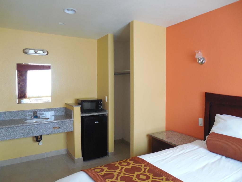Coast Inn Oceanside Rom bilde